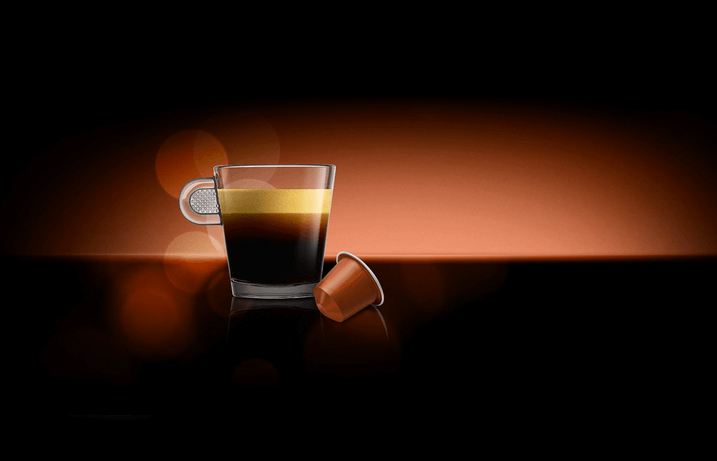 coffee cup and nespresso capsule