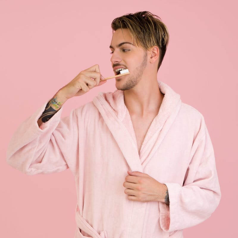 guy brushing teeth