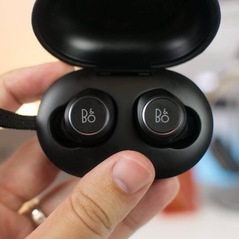 BeoPlay E8 Wireless Earbuds in wireless charging case