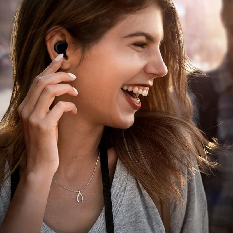 Black Samsung Galaxy Buds wireless headphones in ear
