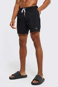 Man Signature Mid Length Swim Shorts + free delivery with code