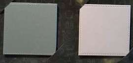 2 reversible grey/pink leather look placemats and coasters - only £1 instore at Poundland (Borehamwood, London)