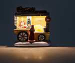Popcorn wagon with light, movement, and music