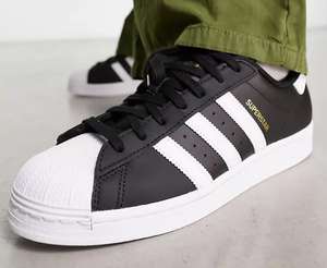 adidas Originals Superstar trainers in black with white stripes with code
