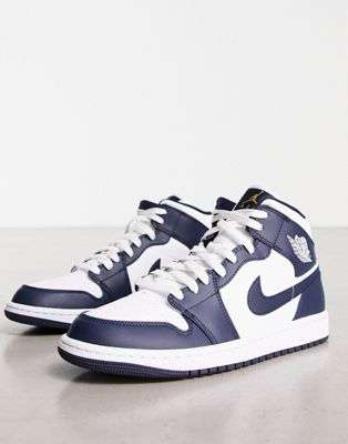 Jordan AJ 1 Mid trainers in navy and white - £91.96 @ ASOS