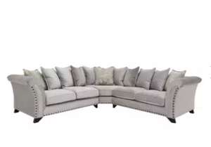 Holly Large Fabric Pillow Back Corner Sofa with Studs at Furniture Village for £1995