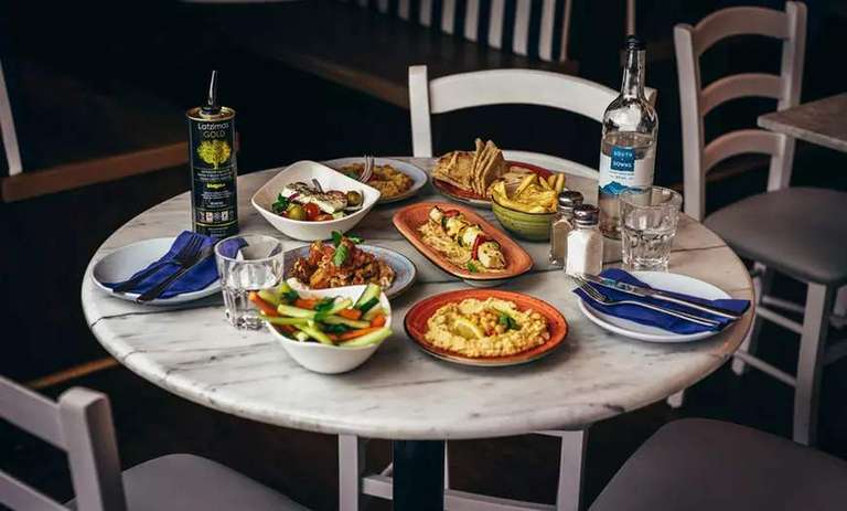 The Real Greek - Four Greek Meze, Two Sides, Flatbread, Crudités, and Two Desserts to Share for Two £25.95 @ Groupon